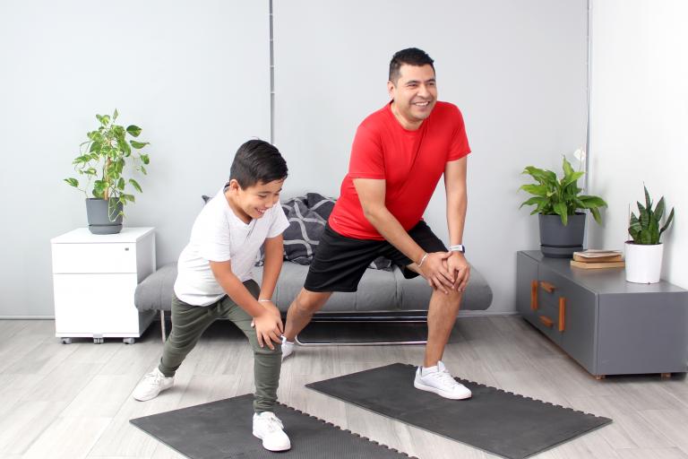 Latino dad and soon exercising at home