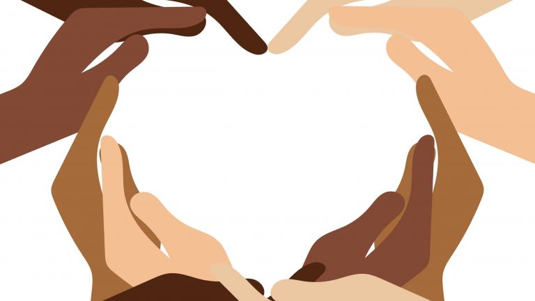 Hands of different colors coming together to form a heart.