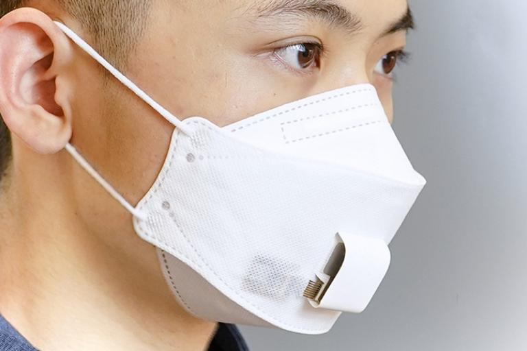Image of a person wearing the smart facial mask